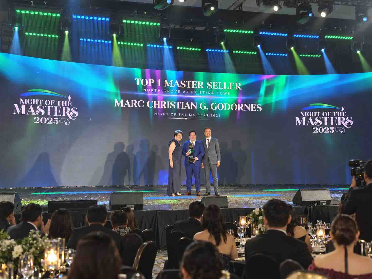 AI-created commemorative composite of Marc with the North Grove award on stage